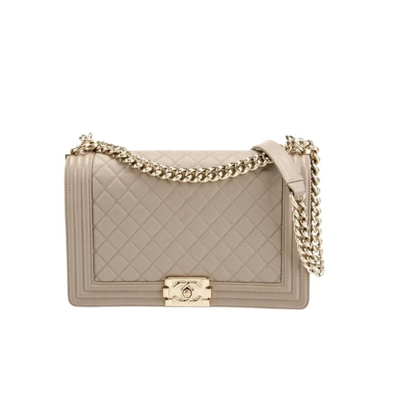 CHANEL Handbags - CHANEL Caviar Quilted New Medium Boy Flap in Beige